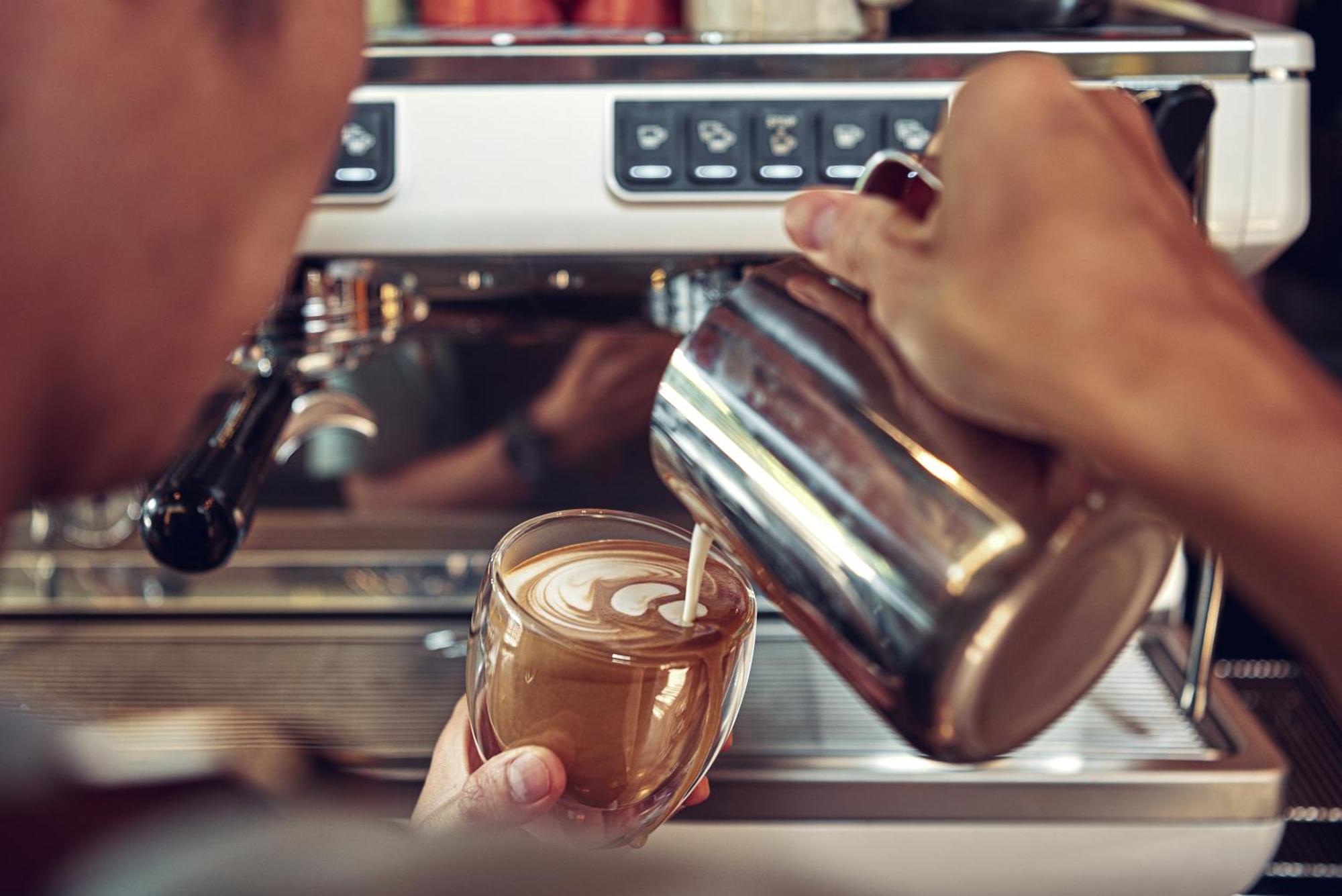 Vie Hotel Bangkok - Mgallery Collection Exterior foto Barista pouring milk into a cappuccino